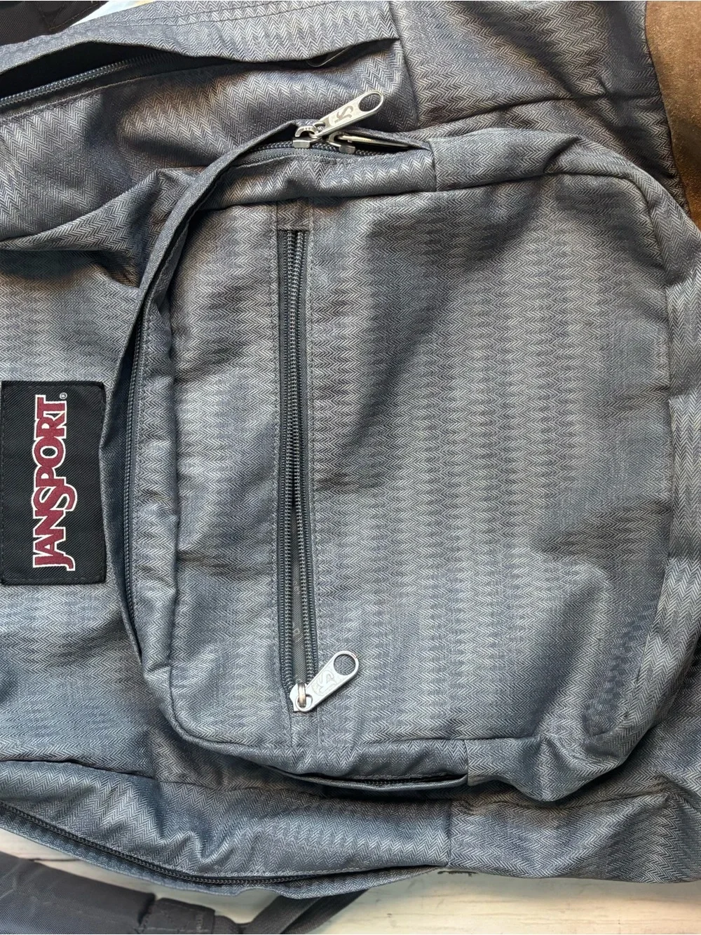 Jansport Gray Backpack with Brown Suede Base
